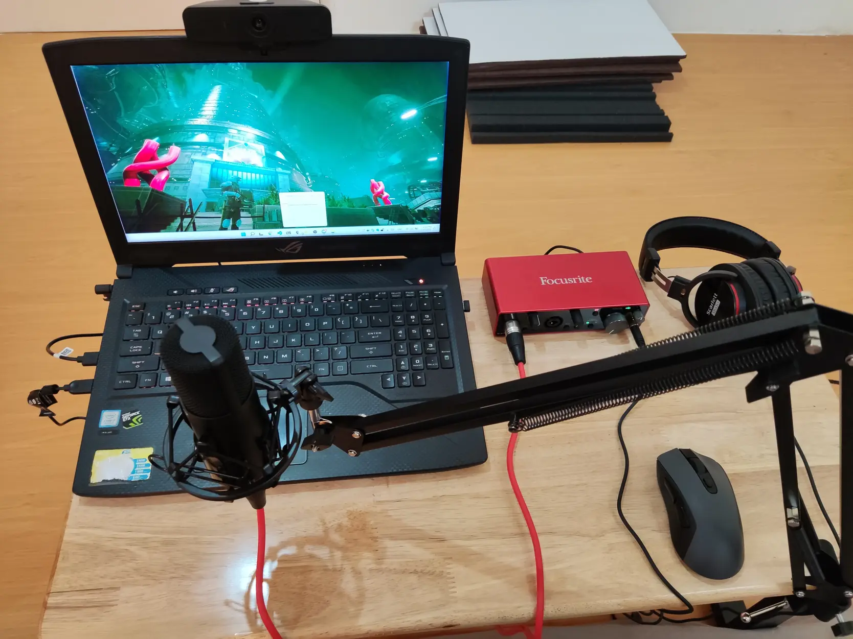 Tom Nguyen working remotely with his laptop